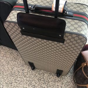 Gucci Webby monogram roller suitcase